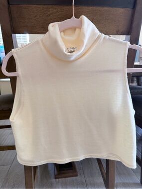Cream Sleeveless Turtleneck Crop Top simple chic